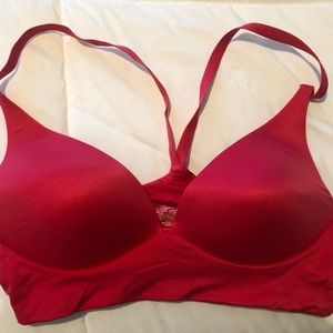 Victoria’s Secret red lightly lined plunge bra in size 34B.